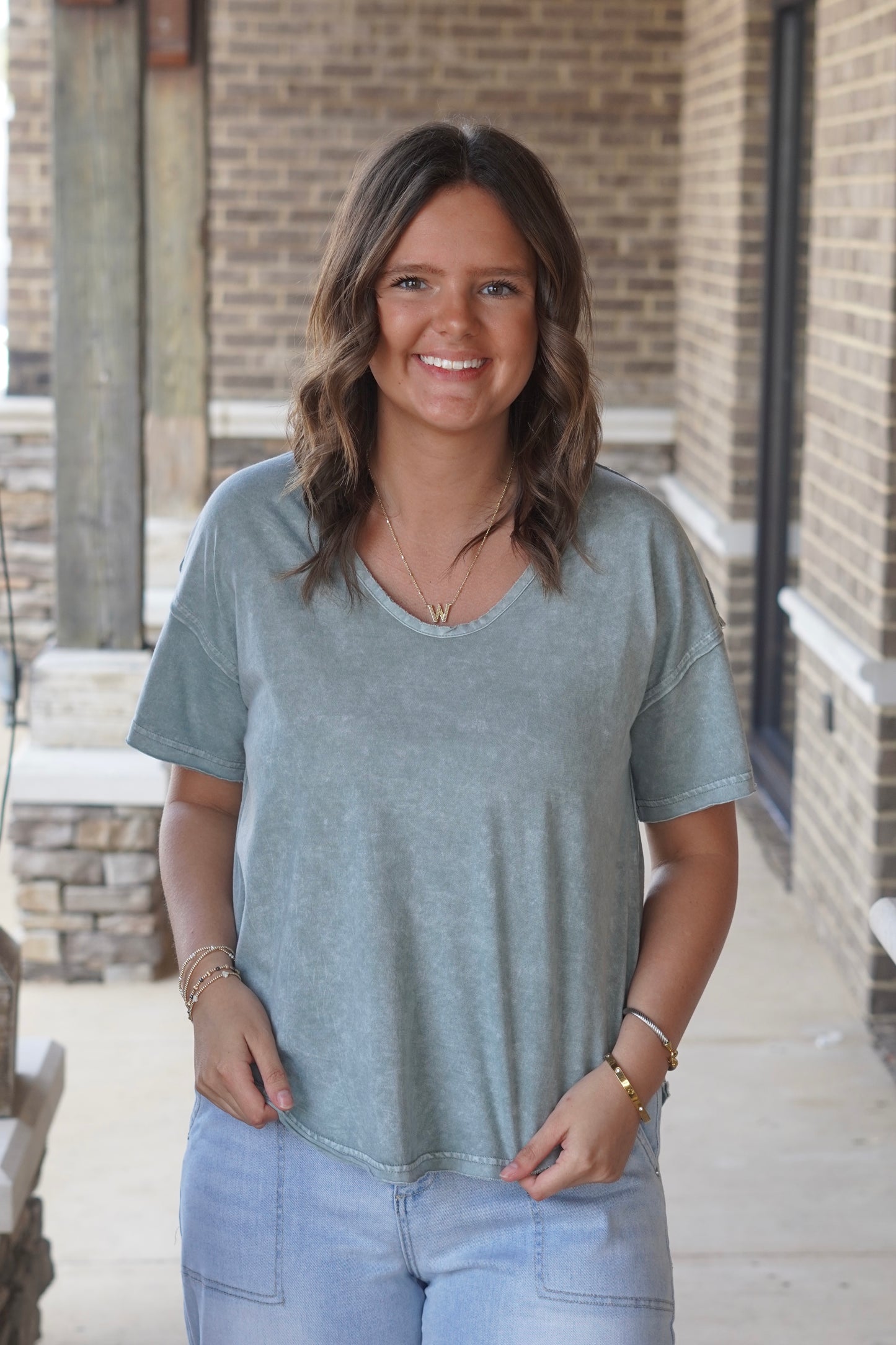 Olive Henley Exposed Seam Top