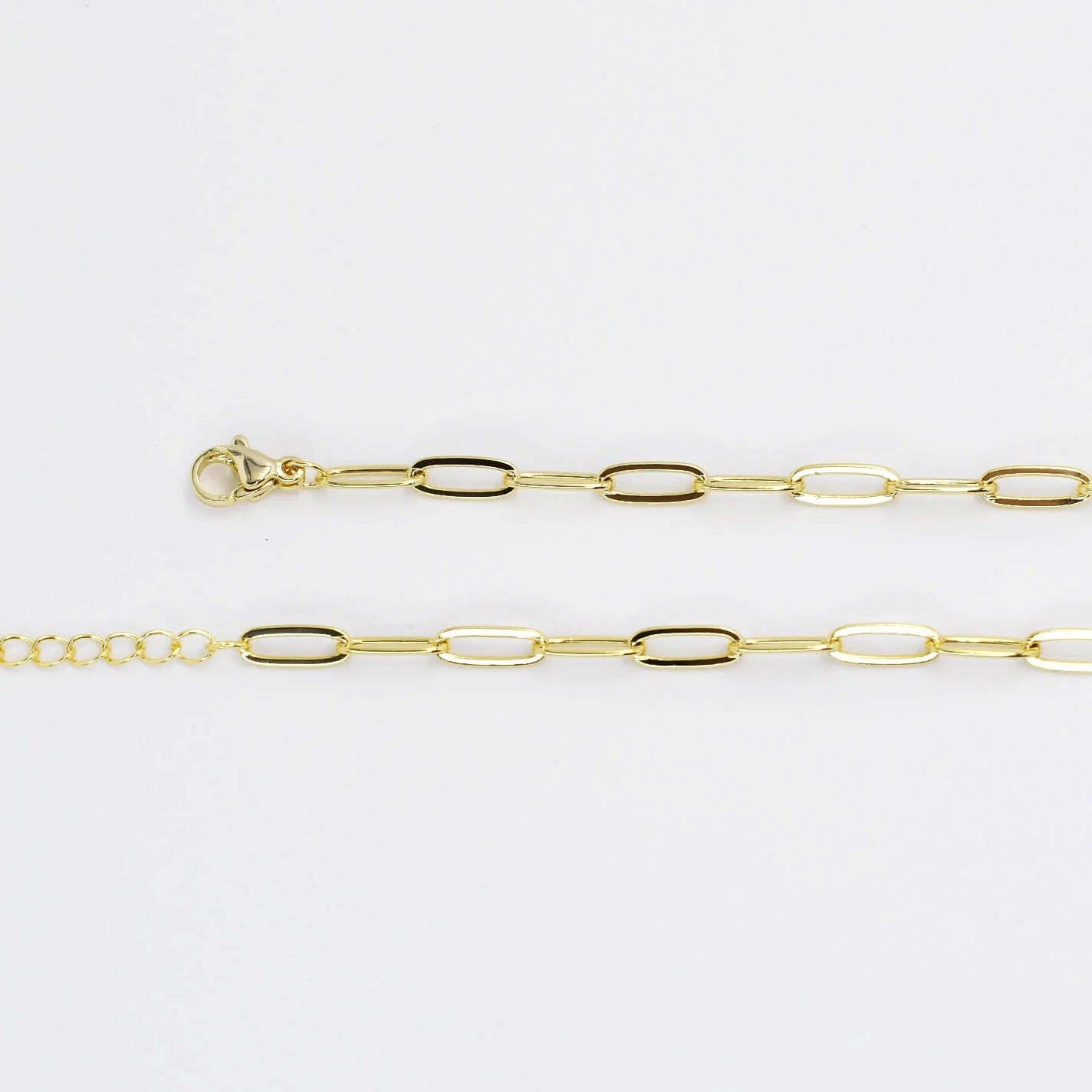 paper clip chain necklace Lobster clasp closure Chains length from 13.5 inches to 15 inches. Gold Plated