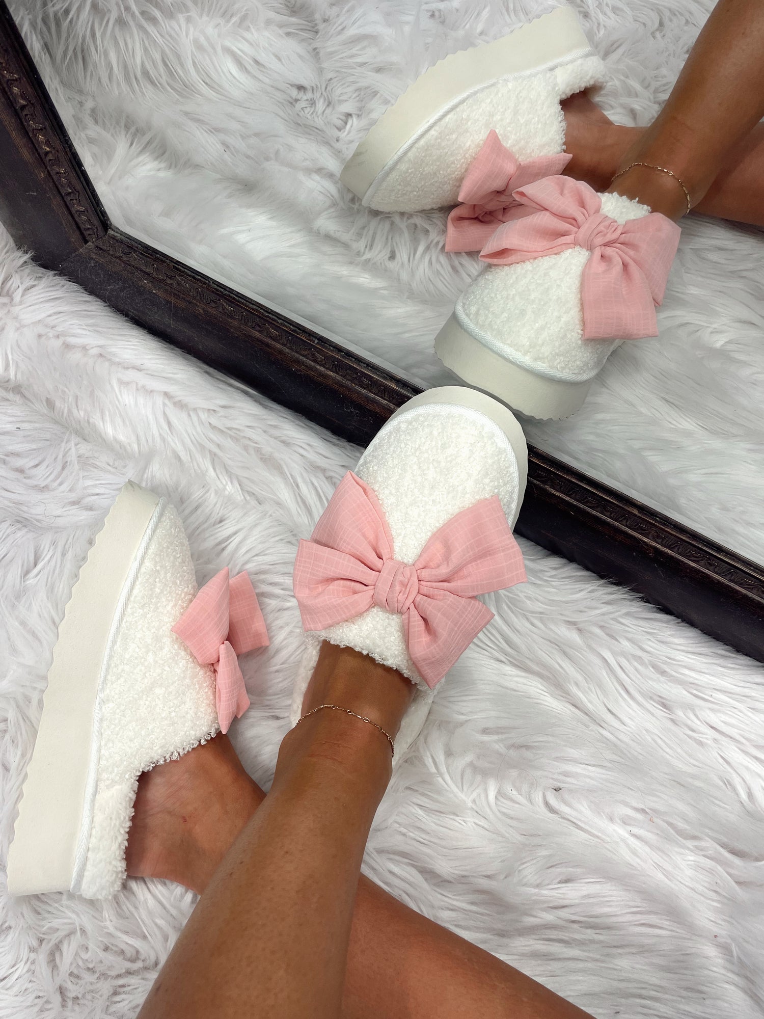 The cutest slipper you need in your life!! The Bella Bow Slipper is a trend you don't want to miss out on!Bella Bow Slipper with Faux Fur, Blush Bow On Slipper, Platform