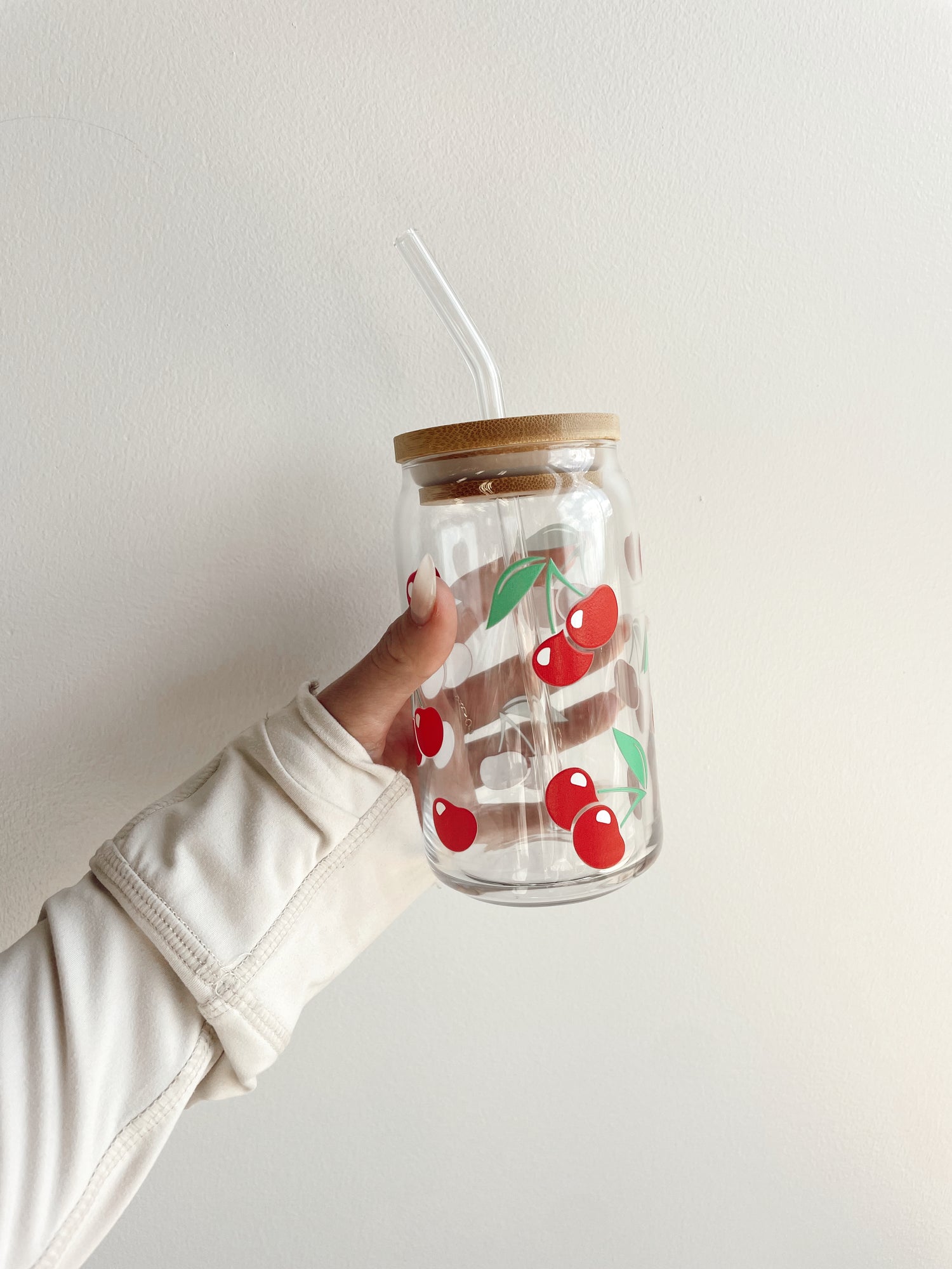 clear glass tumbler with clear glass straw. printed with cherries