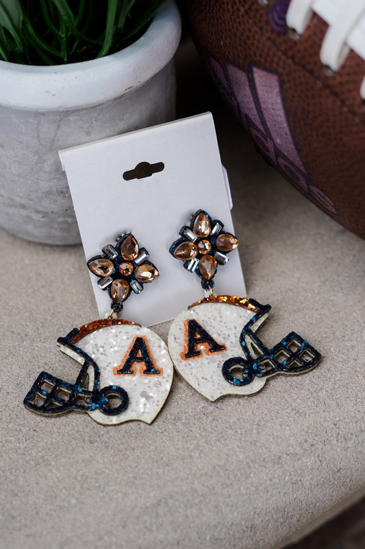 Are you hollering, "War Eagle!!" but don't want to wear the traditional tiger gear today? These Auburn Glitter Helmet Earrings will add just the pop you need to your game day outfit!!  Auburn Glitter Helmet Earrings Post Stud Back. White beaded football helmet with orange and navy "A".