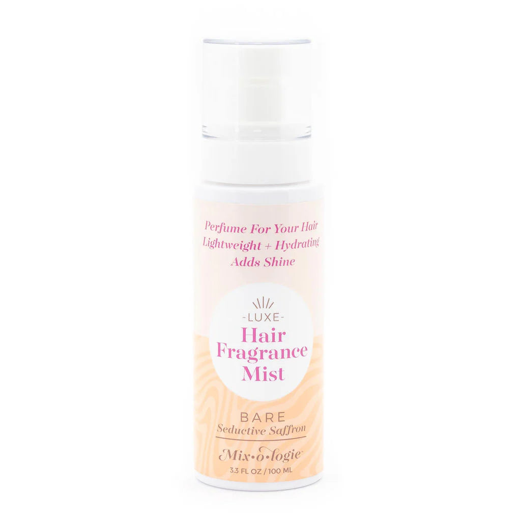 3.3 oz bottle of hair mist