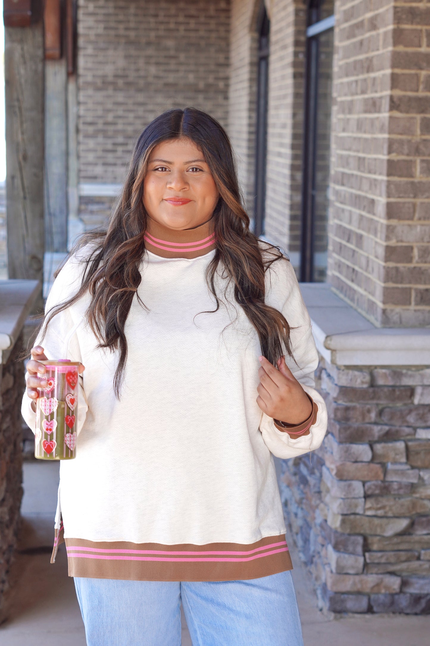 Cream Mockneck Sweater with Brown and Pink Striped Trim on Bottom, Sleeves, and Neckline, Oversized Fit, Slits Up the Side