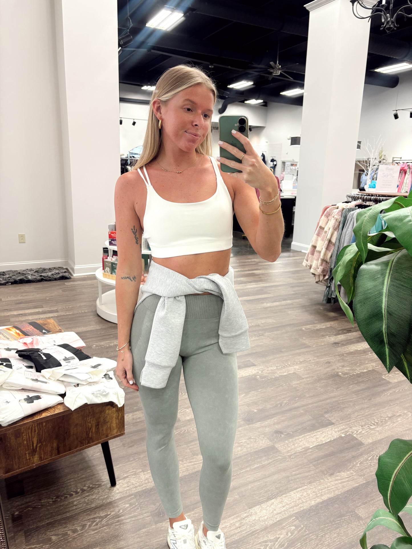 powder color sport bra, scoop neckline, dig-free straps. 