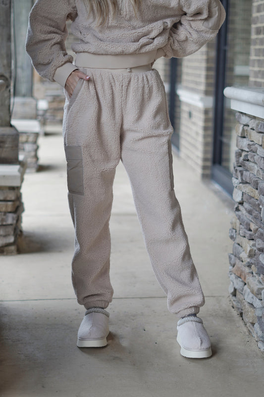 Stay warm and cozy all Fall and Winter long in the Teddy Sherpa Joggers! Wear these separately or pair them with its matching top, the Teddy Sherpa Quarter Zip!