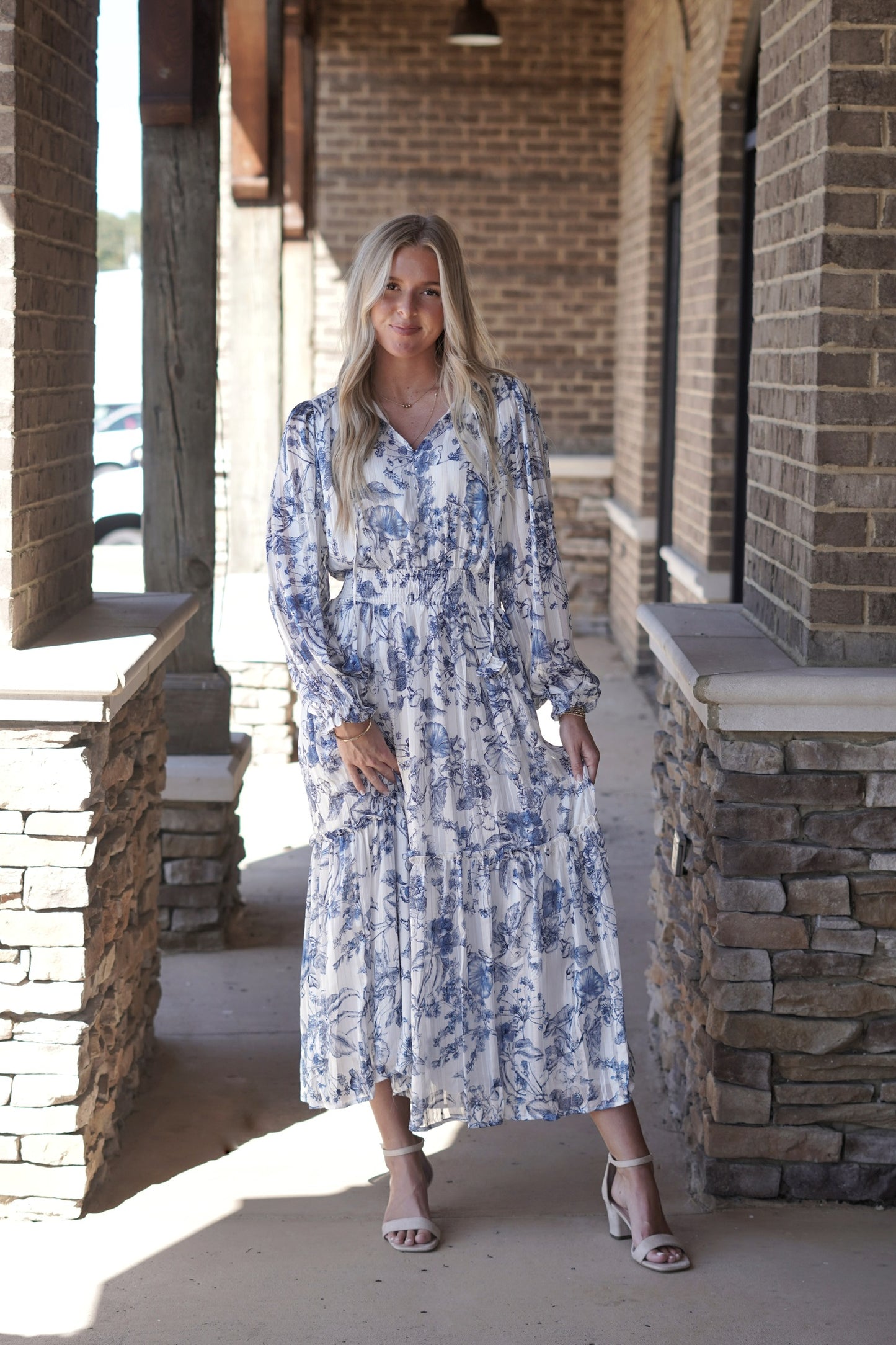 Elegant Midi Dress, Tie Neck, Smocked Above Waistline, Long Full Length Sleeves, Shiny Gold Detail in the Pattern, True to Size, Midi Length
Colors: Blue
Fabric Content: 97% Polyester, 3% Metallic