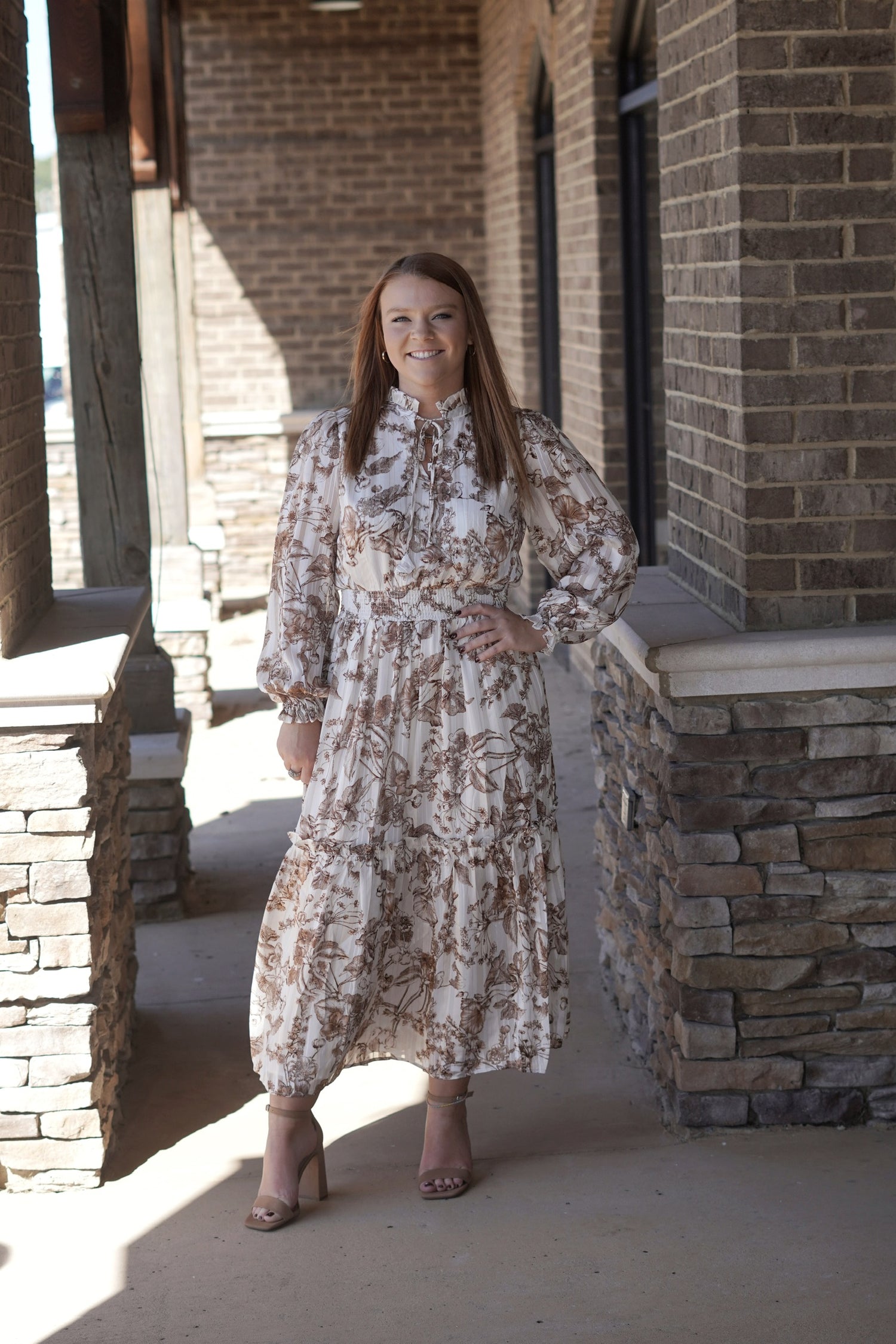 Elegant Midi Dress, Tie Neck, Smocked Above Waistline, Long Full Length Sleeves, Shiny Gold Detail in the Pattern, True to Size, Midi Length
Colors: Brown
Fabric Content: 97% Polyester, 3% Metallic