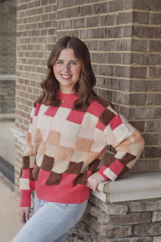 Coral Checker Board Sweater. Crew Neckline. Long Sleeves. Sweater. Checkered Print. Relaxed Fit. Full Length
Color: Coral(Pink,White,Light Pink,Brown, and Tan Checkered)
Fabric Content: 42% Acrylic, 30% Polyester, 28% Nylon