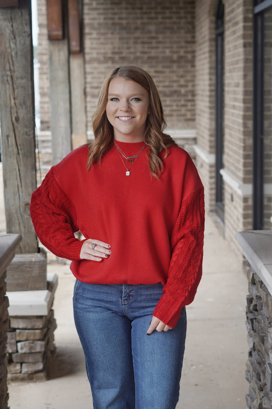 Rosie Red Cable Knit SweaterCrew Neckline. Long Sleeve. Cable Knit Sleeves. Full Length. Oversized Fit
Color: Red
Fabric Content: 50% Viscose, 30% Acrylic, 20% Polyester 