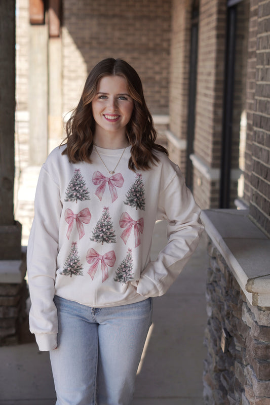 Pretty in Pink Bows And Trees Sweatshirt
Crew Neck

Sweatshirt
Pink Bows And Trees Graphic
Color: Cream
Full Length Sweatshirt
Fabric Content: 100% Cotton