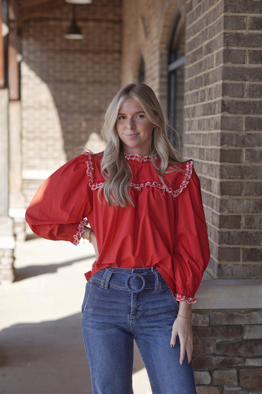 Holiday in Style Blouse
Crew Neckline
Ruffle Around the Neck
Regular Fit
Embroidery Details
Bubble Long Sleeves
Full Length
Color: Red
Fabric Content: 80% Polyester, 20% Cotton