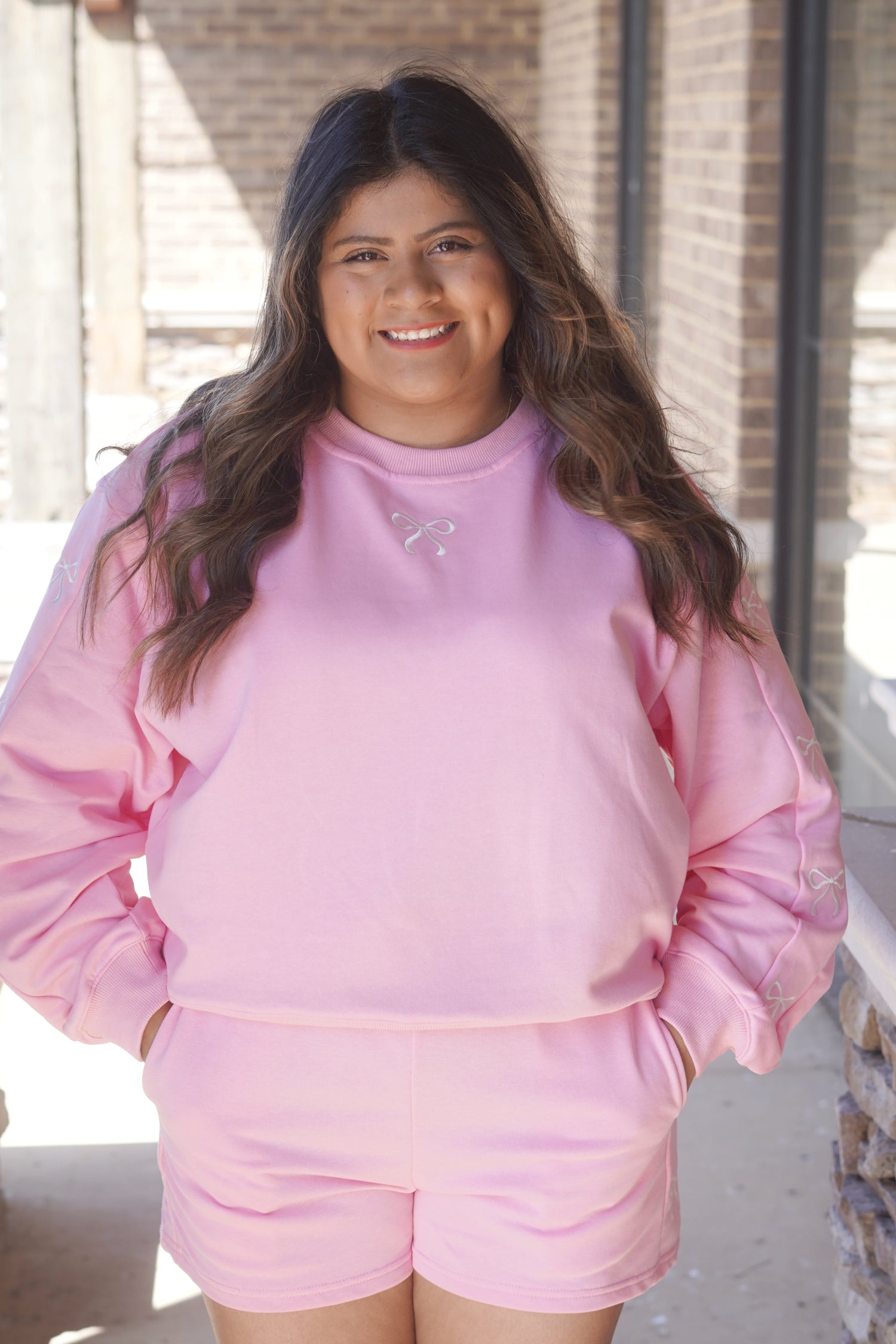 pink long leave with bow details