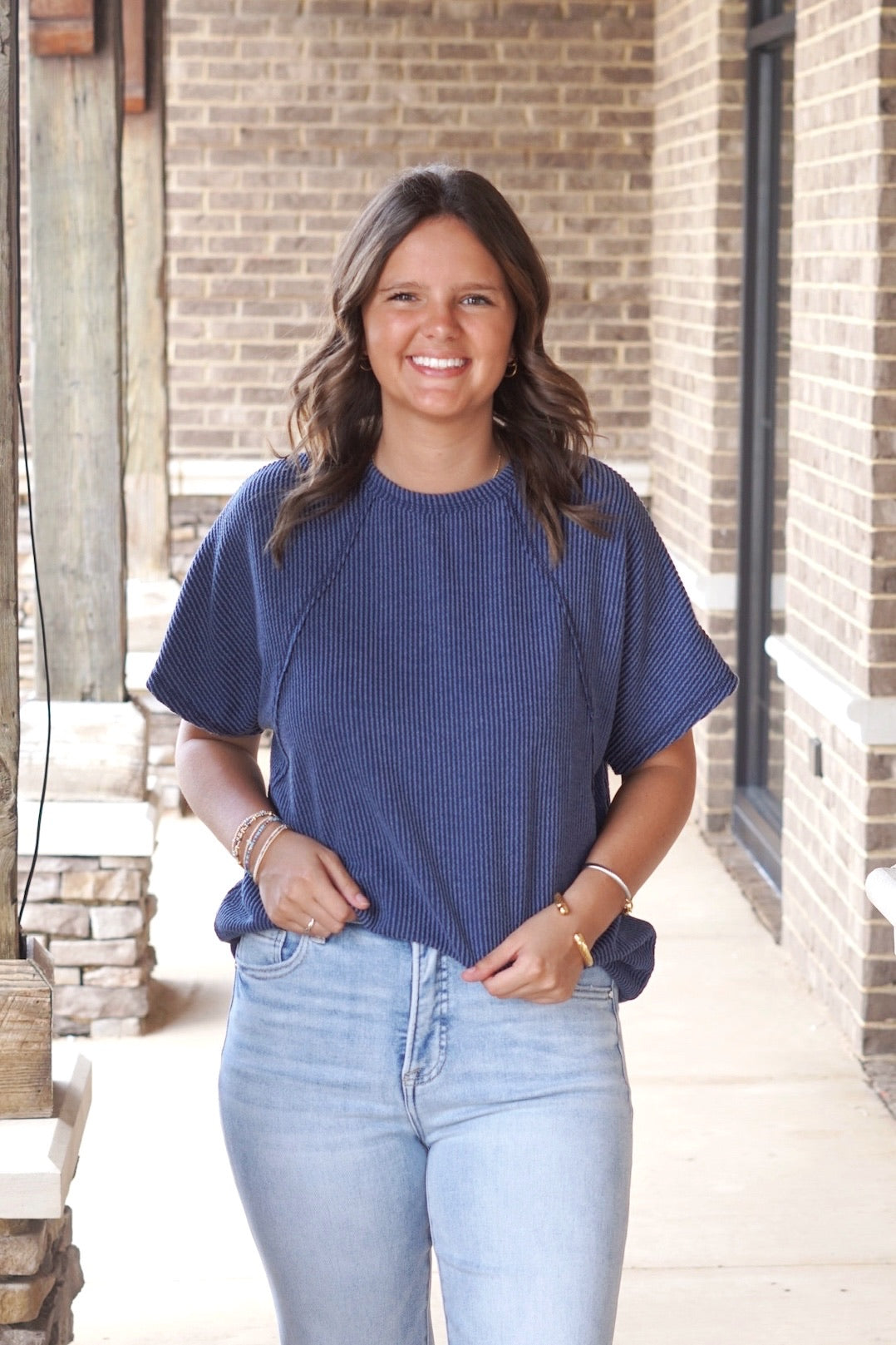 short sleeve navy colored top, corded texture, relaxed fit