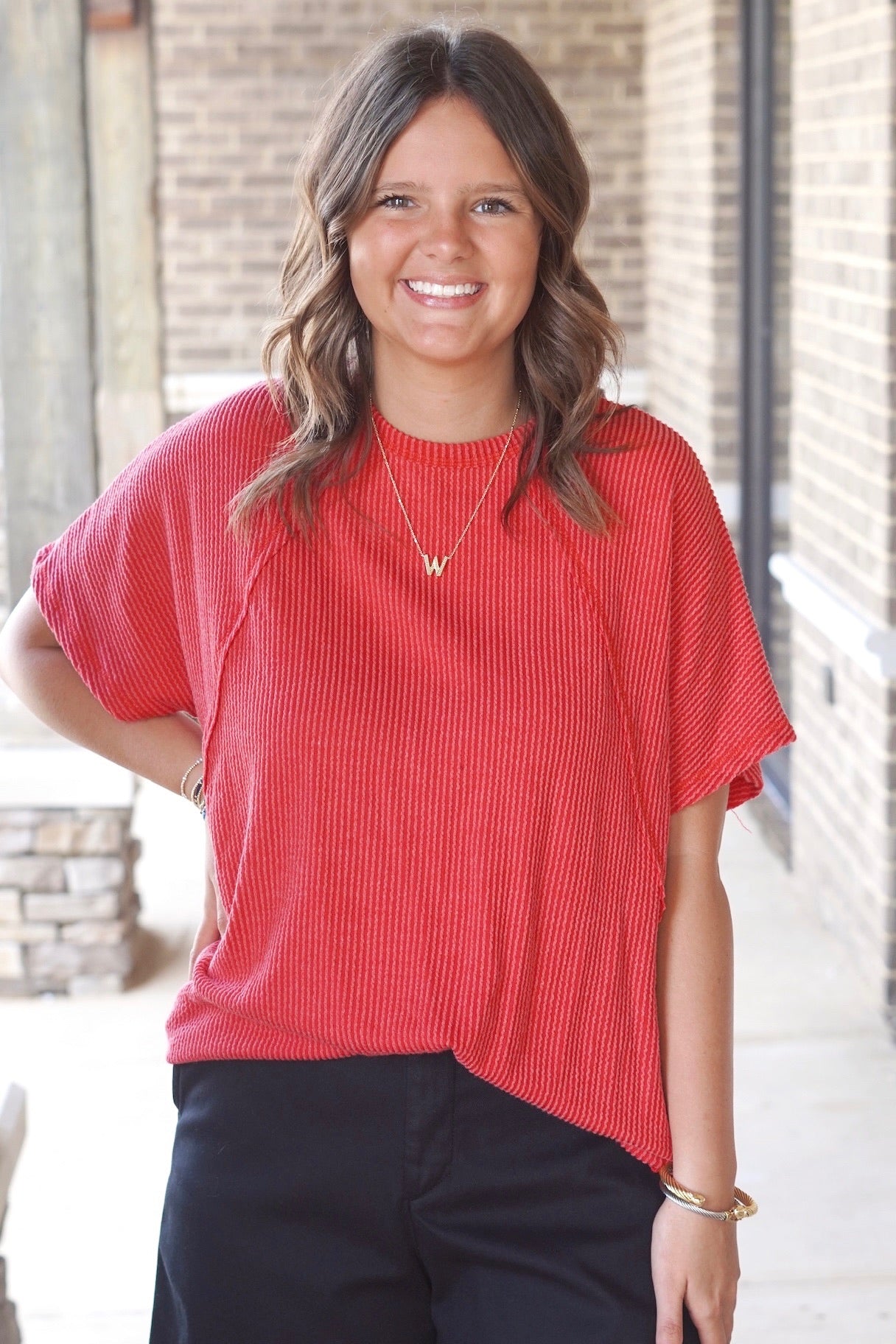 short sleeve red colored top, corded texture, relaxed fit