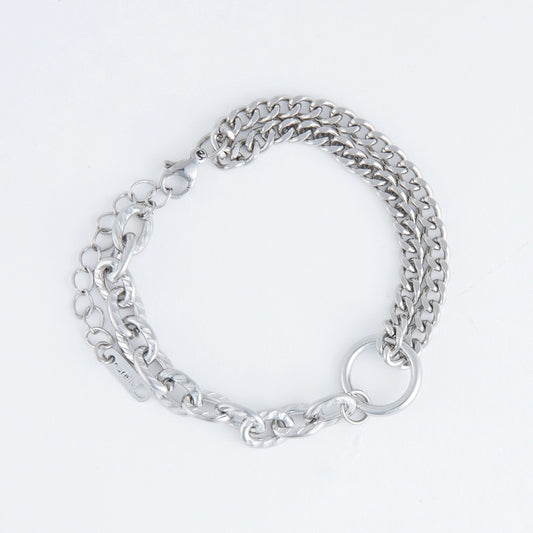 Sliver chain bracelet mixed links style with a circle ring connecting them and lobster clasp. 