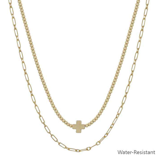 gold two layered necklace, beaded chain with cross. 