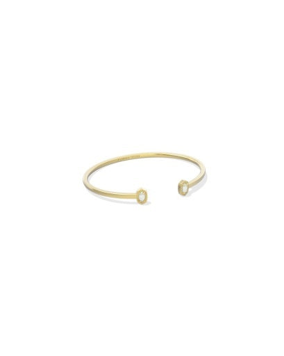 Gold open cuff bracelet with white stone at the end.