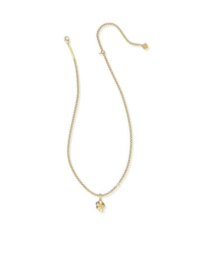 Gold necklace with a sculptural knot pendant