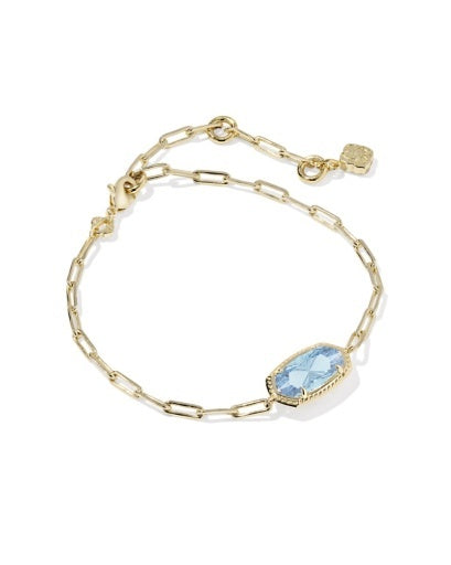 Gold chain bracelet with oval light blue pendant and gold clasp closure