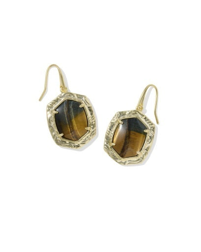 A pair of gold-toned dangle earrings with faceted brown gemstone inlays, shown against a plain white background.