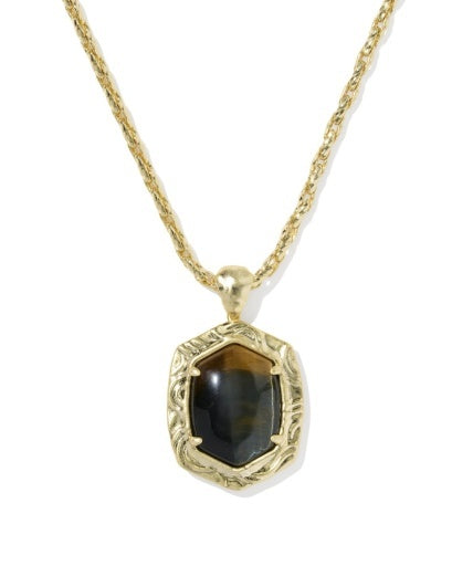 A gold chain necklace with a textured gold bezel holding a dark brown and black tiger's eye pendant, shown against a plain white background.