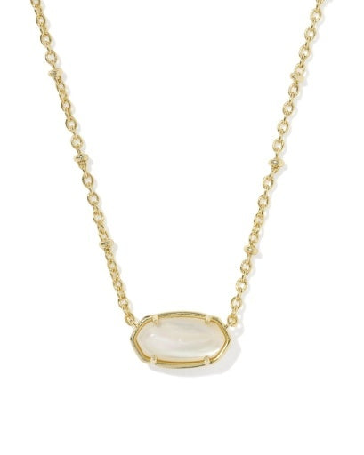 A gold chain necklace with an oval white stone pendant.