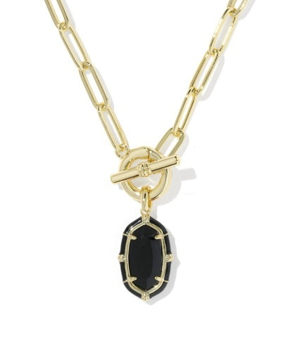 Gold Paper Clip toggle chain necklace with black pendant. 