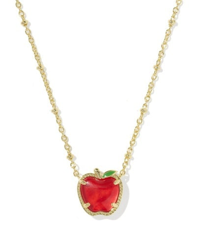 A gold chain necklace featuring an apple-shaped pendant with a vibrant red center, a small green leaf accent, and a delicate gold border, shown against a plain white background.