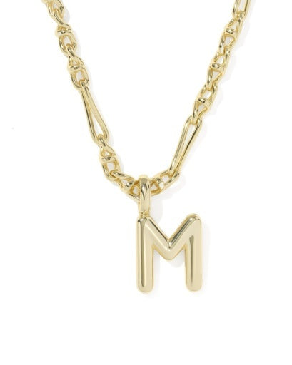 A gold initial necklace featuring a polished letter 'M' pendant on a twisted link chain, shown against a plain white background.