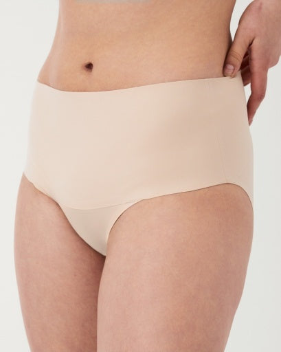 Model wearing Spanx Beige Brief Panties in Beige