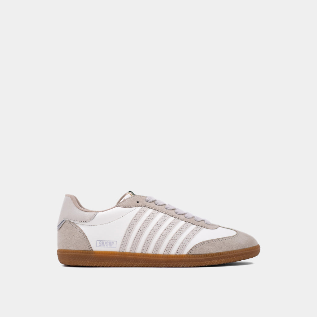 White and beige sneaker, Side-stitched stripes, suede overlays, timeless gum sole, metallic silver heel tab