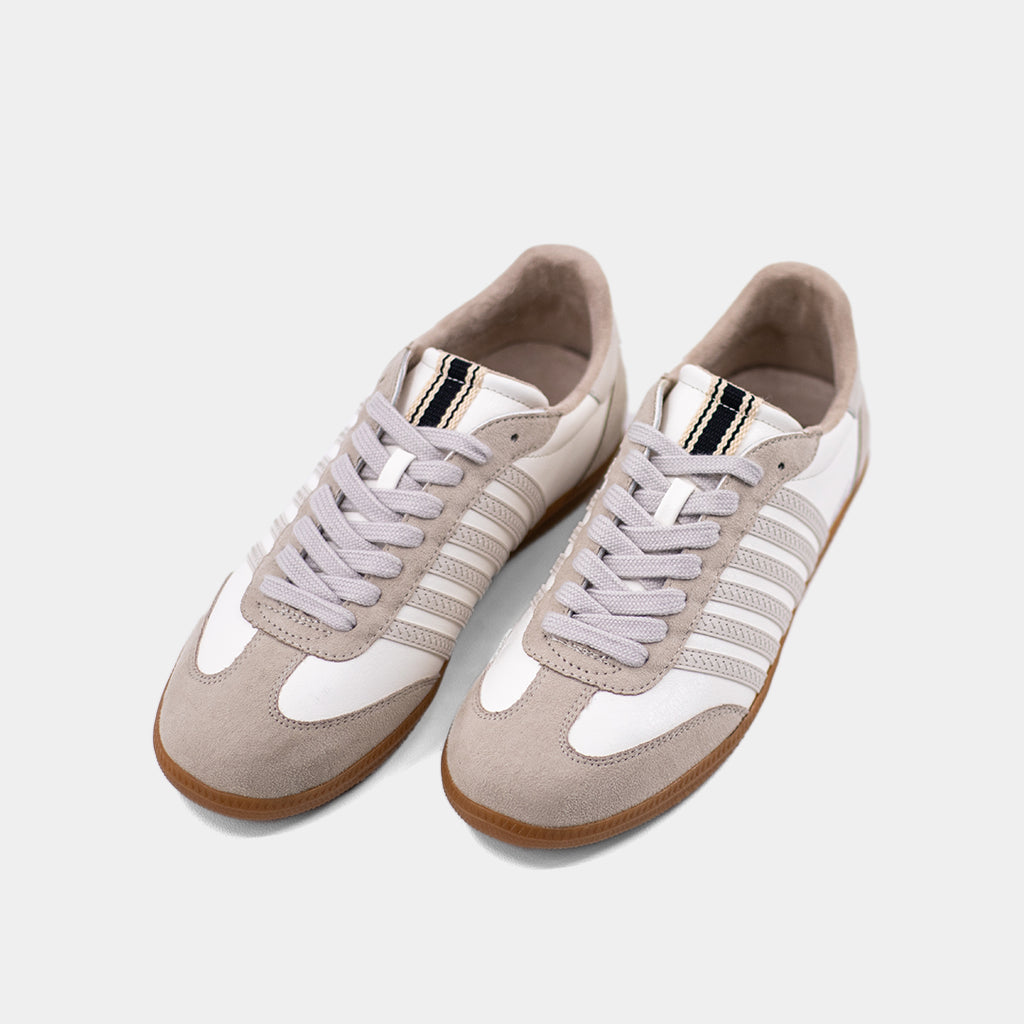 White and beige sneaker, Side-stitched stripes, suede overlays, timeless gum sole, metallic silver heel tab