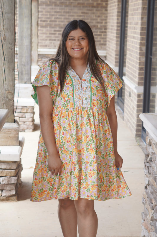 Women Wearing Yellow Floral Pattern Dress, V-Neckline, Cap Sleeves, Half Button Detail, Mini Dress.
