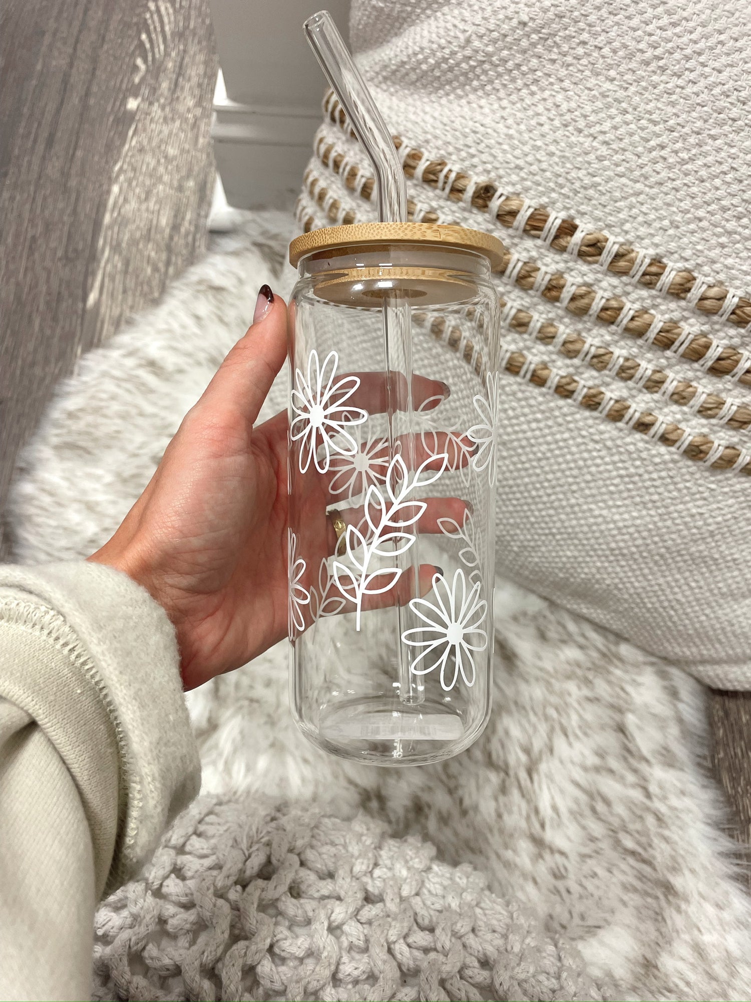 clear class cup with straw with white floral design