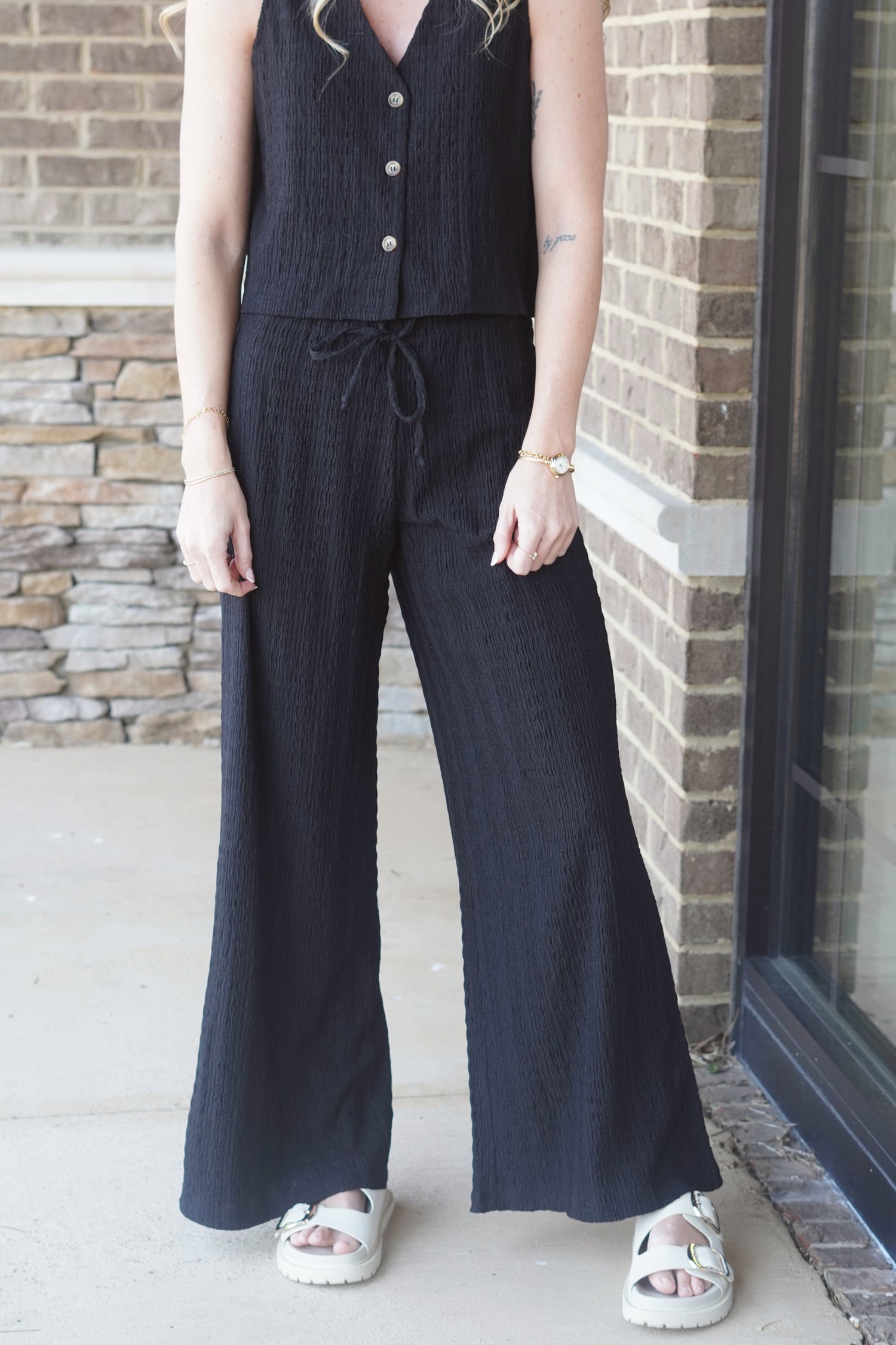 Black Flowy wide Texture Pants with an Elastic drawstring waistband. 