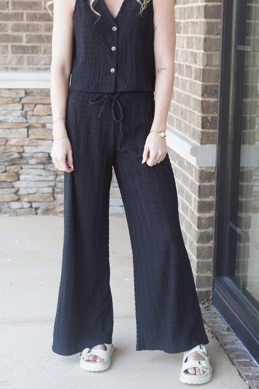 Black Flowy wide Texture Pants with an Elastic drawstring waistband. 
