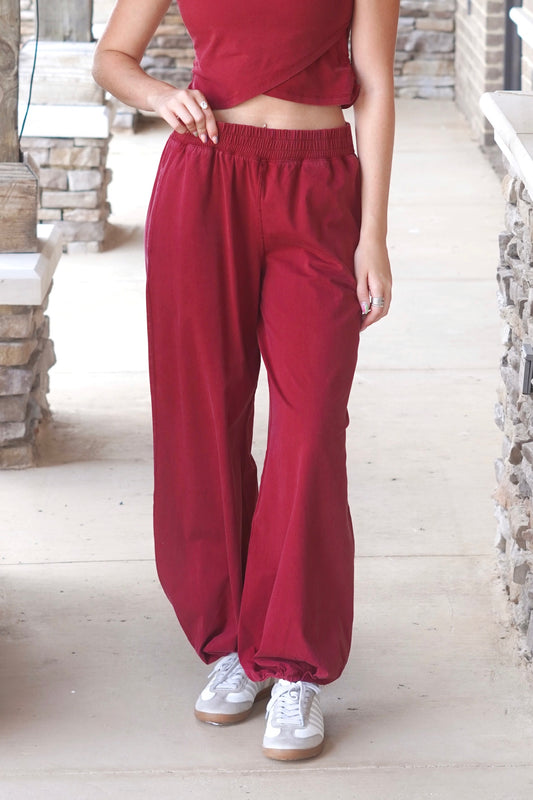 Red mineral washed joggers, cinched waist, mid rise