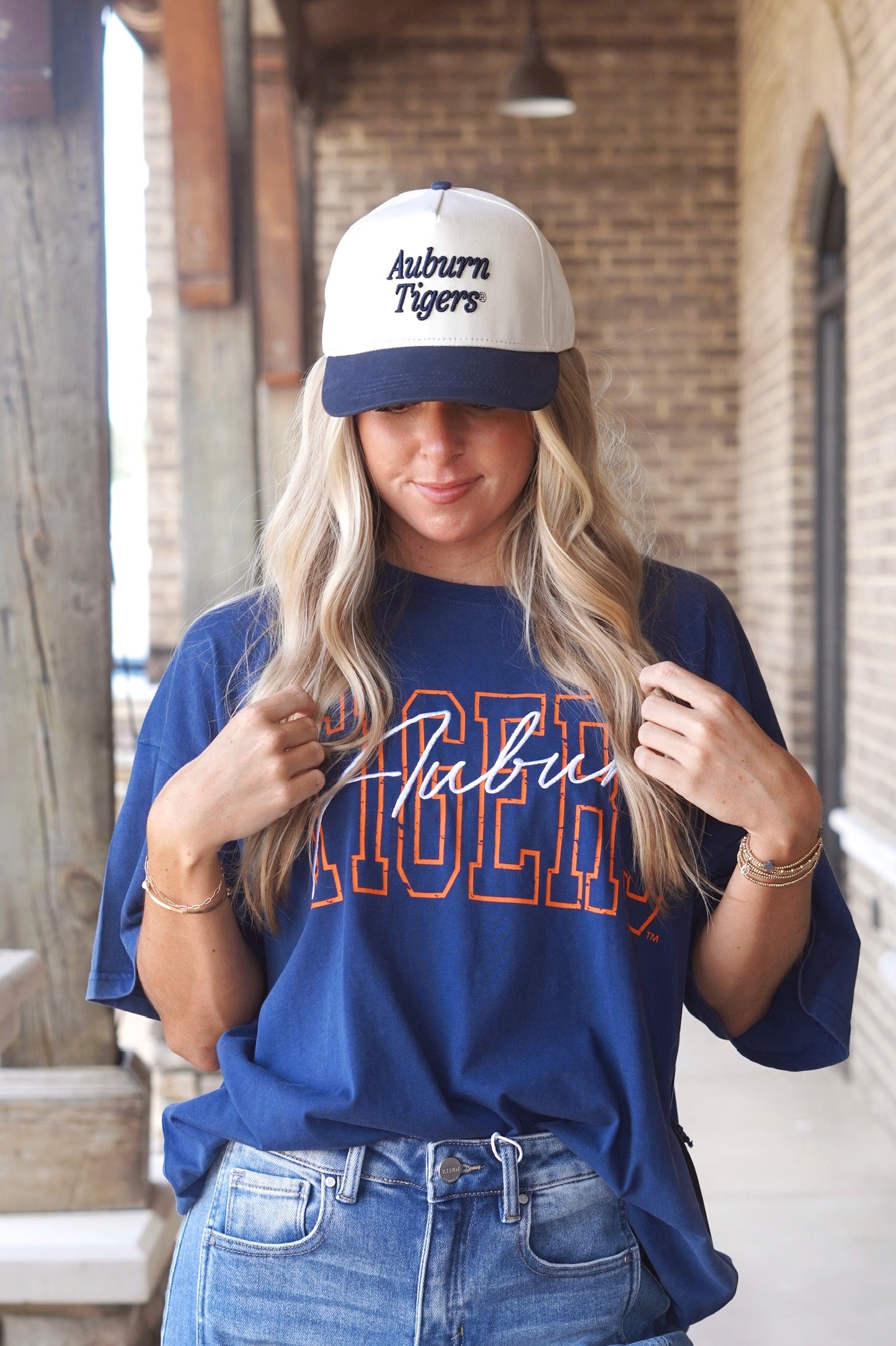 snap back Auburn Tigers hat 
cream with blue bill