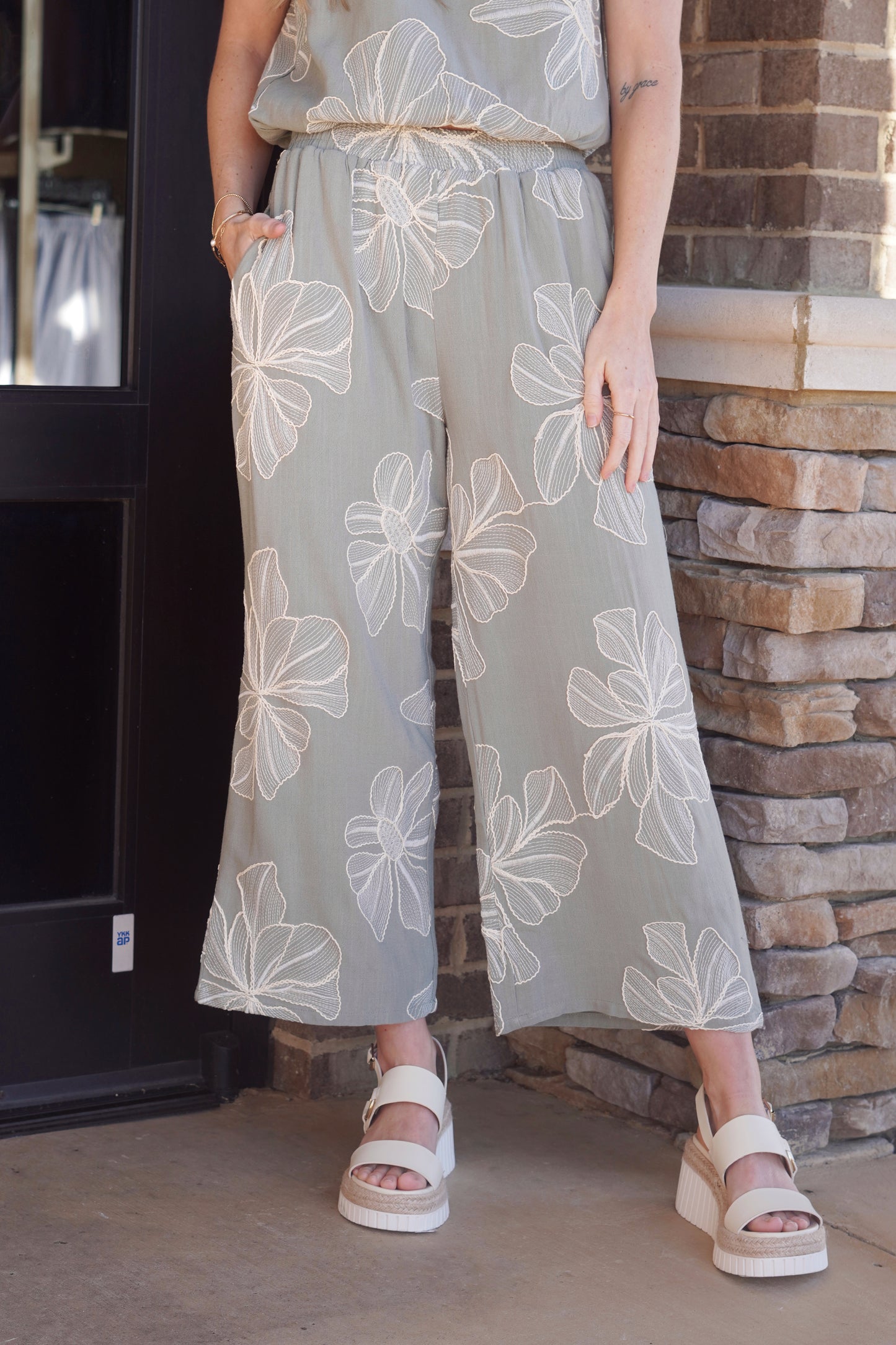 Sage pants with a ivory embroidered floral print, wide leg, elastic waistband