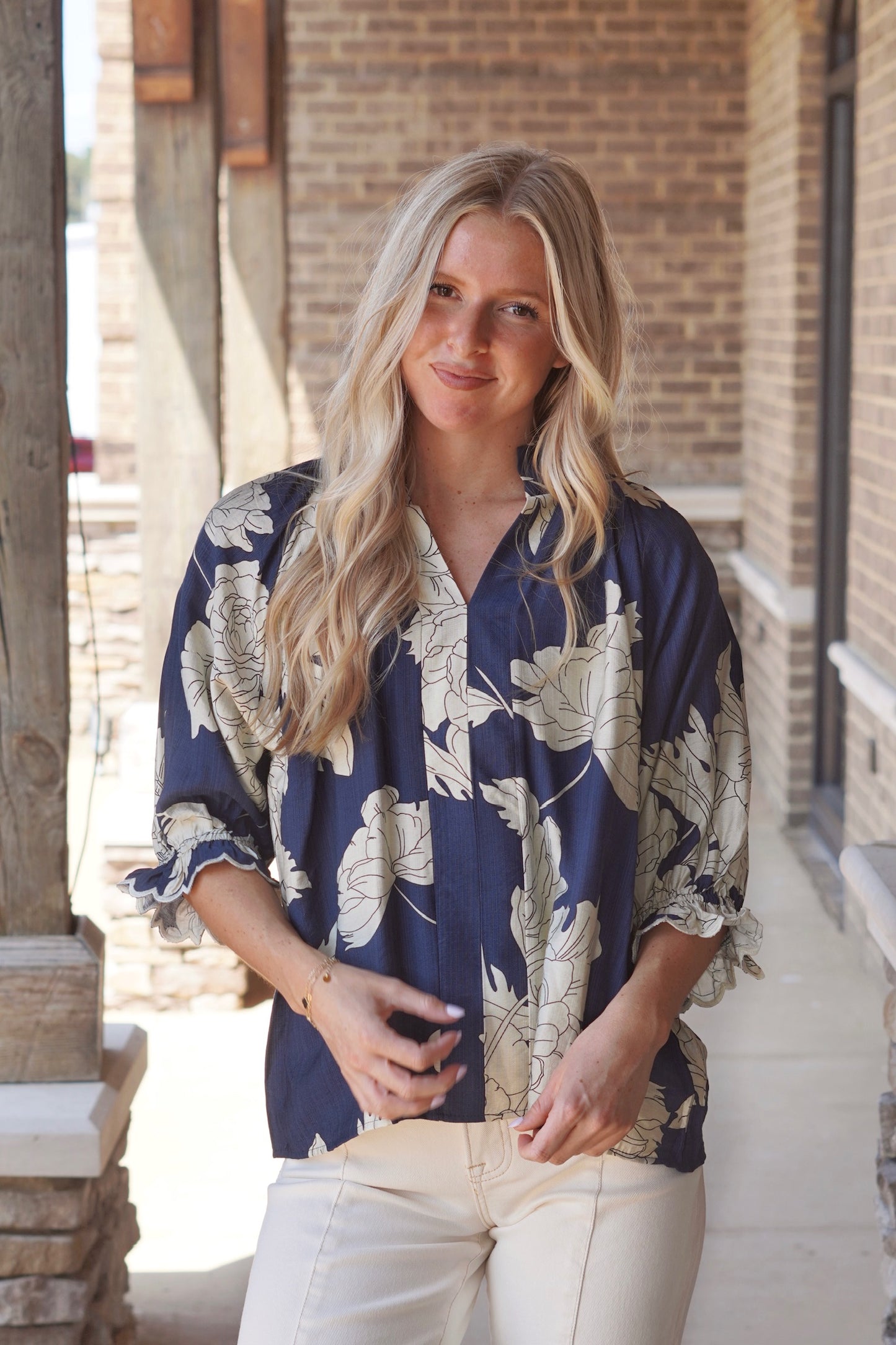 Peony Scallop Sleeve Blouse,  V-Neckline, Puff Short Sleeve, Scallop Sleeve Hem, Full Length, Relaxed Fit, Peony Print, Colors: Navy.  