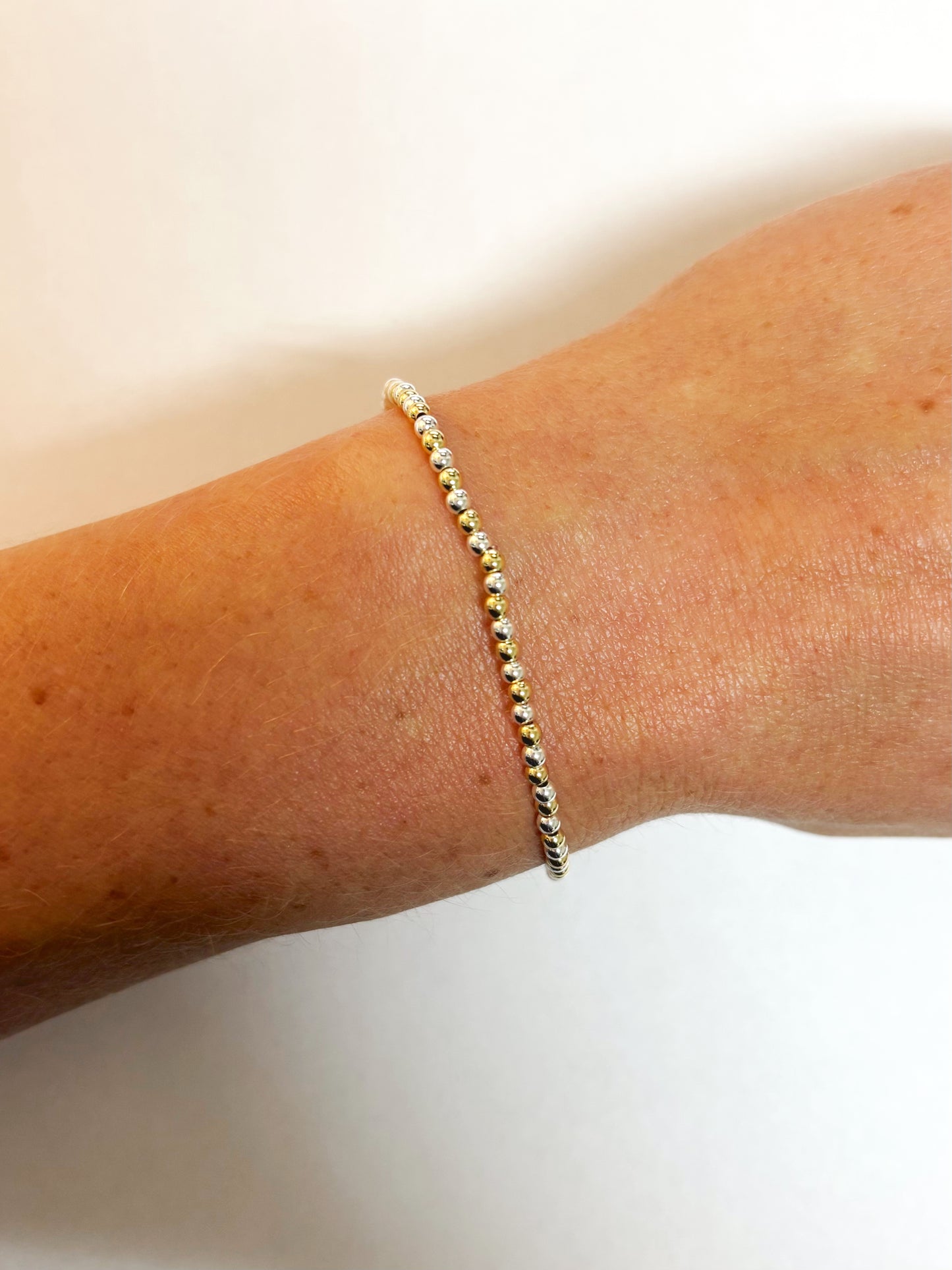 2.5mm Silver And Gold Mixed Round Beaded Bracelet