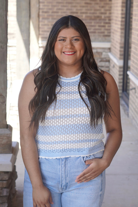 Women wearing a light blue and white striped crochet top, sleeveless, round neckline, scallop edges 