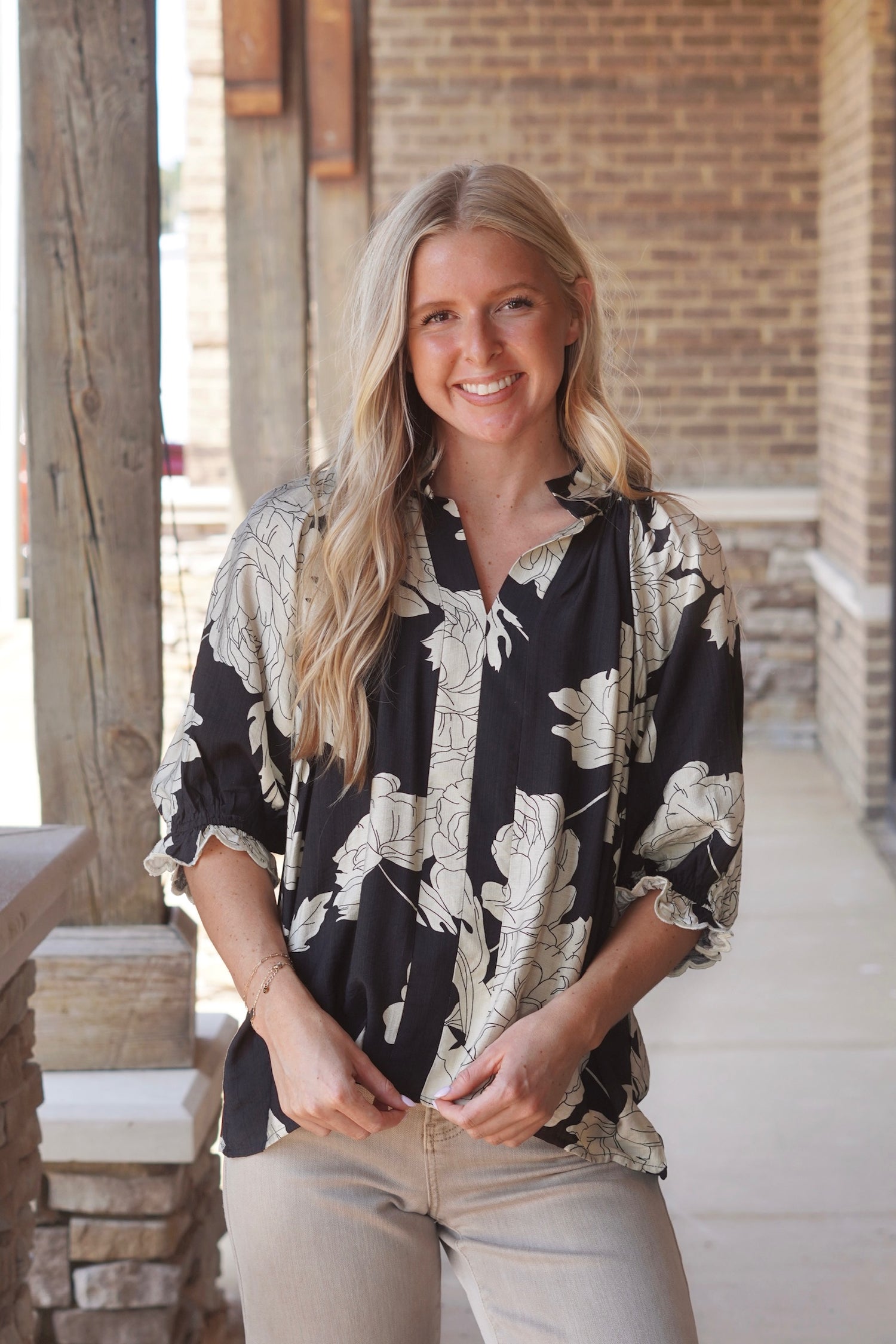Peony Scallop Sleeve Blouse, V-Neckline, Puff Short Sleeve, Scallop Sleeve Hem, Full Length, Relaxed Fit, Peony Print, Colors: Black. 