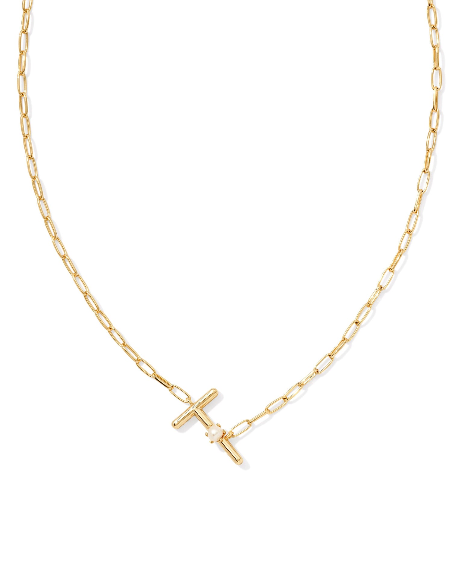 gold necklace with an initial pendant that has a singular pearl stud on it. Initial T