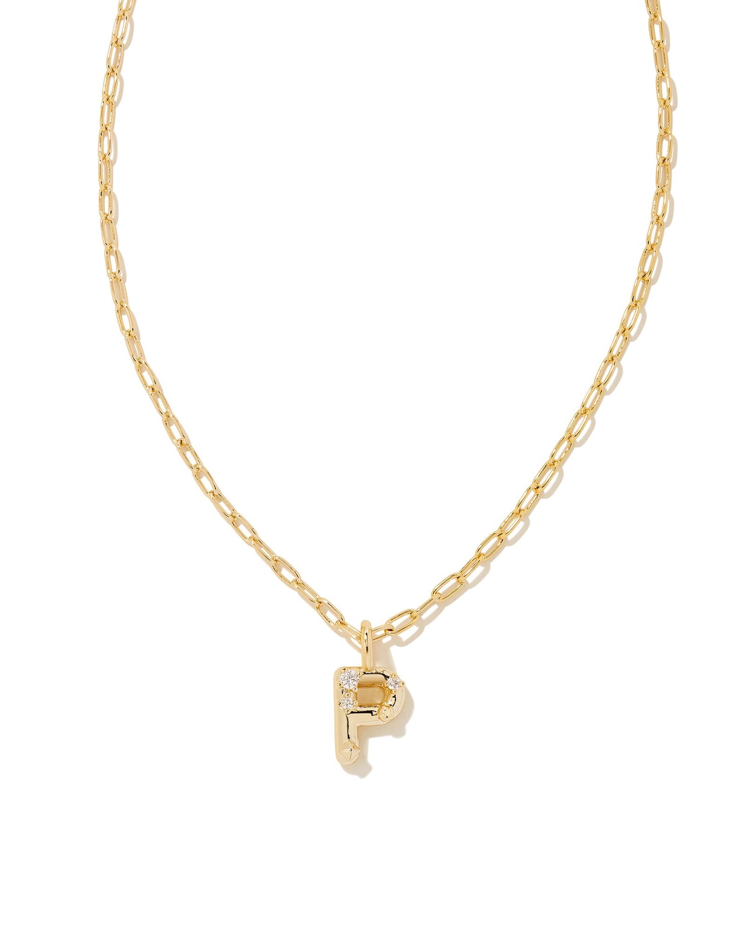 Personalize your everyday look with the Crystal Letter Short Pendant Necklace in White Crystal. Whether you’re rocking your initial or a loved one’s, this sentimental layer is one you’ll keep coming back to again and again.  Dimensions- 16' CHAIN WITH 3' EXTENDER, 0.62'L X 0.35"W PENDANT Metal- 14K Gold plated over brass Closure- Lobster Clasp Material-   White CZ Letter P