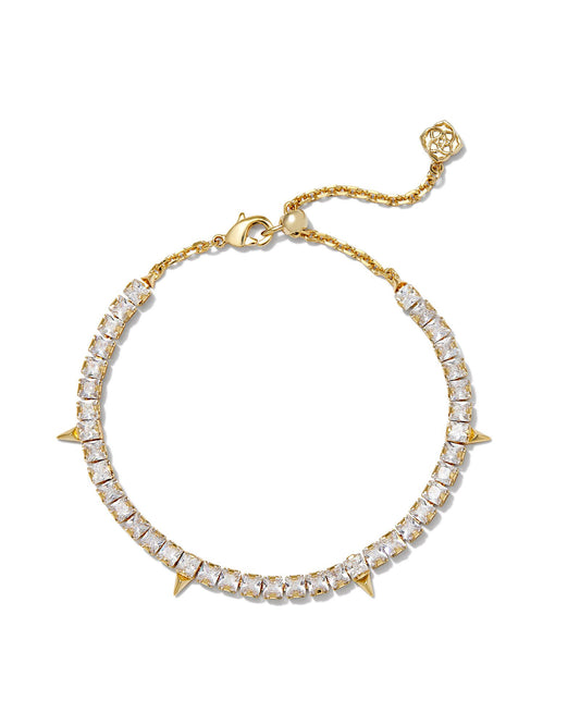 Gold tennis bracelet with sliding lobster clasp and spike details