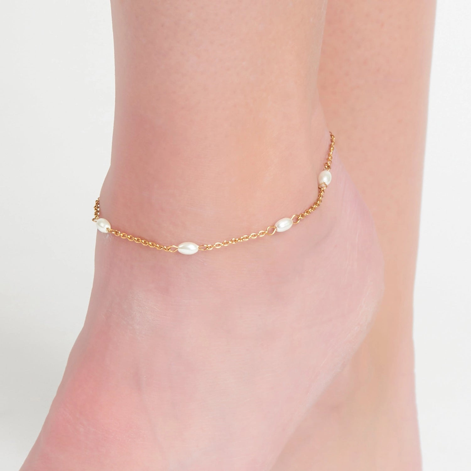 Pearl Anklet a singular delicate chain in a classic gold with pearl accents