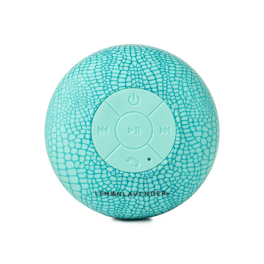 Splash-proof design with suction cup backing Pure bass sound + full call and volume control 32 feet Bluetooth-certified connection Perfect for everyday use and self-care days Charging cord included Colors: Blue Snakeskin Print