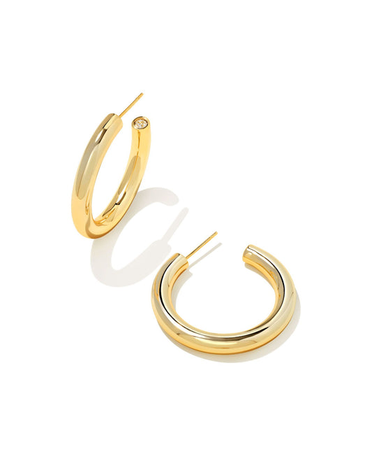An essential part of any collection? A classic pair of lightweight hoops. Universally flattering, the Colette Hoop Earrings in Gold feature a bold-but-subtle silhouette, designed to elevate your look year-round.  Dimensions- 1.26" Outside Diameter Metal- 14k Yellow Gold Over Brass Closure- Ear Post 