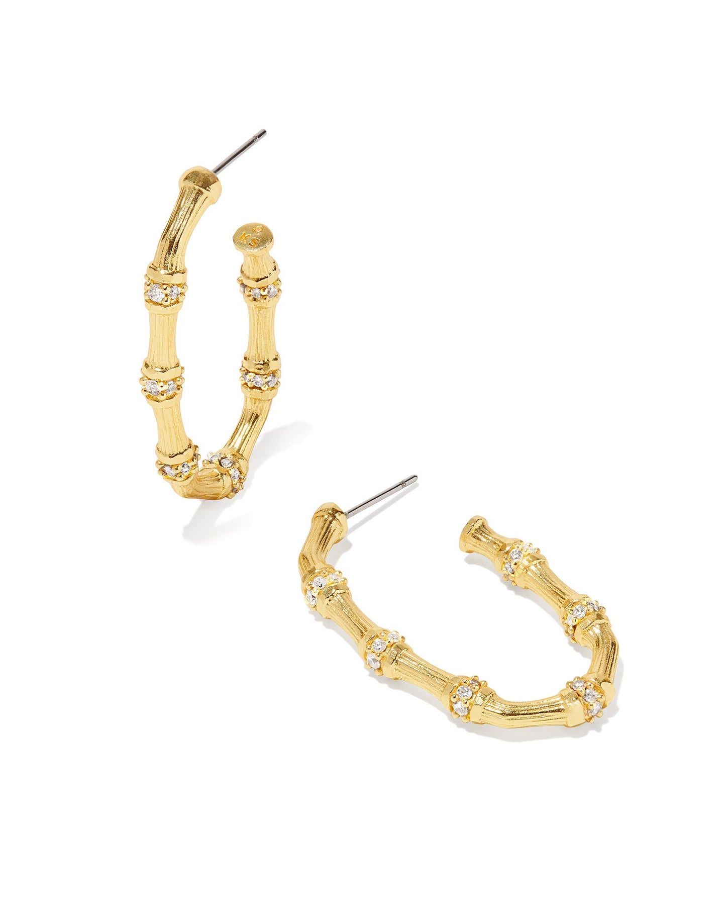 Sculptural, striking, and full of sparkle, the Maura Gold Bamboo Hoop Earrings are an eclectic essential you’ll love. Our spin on the classic bamboo hoop style features crystal embellishments and our distinct Danielle silhouette. They’re a bit of jewelry history you’re sure to show off—and create major ear stack envy wearing.